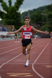 University's Edwards claims boys' 3,200-meter title, snaps state meet record